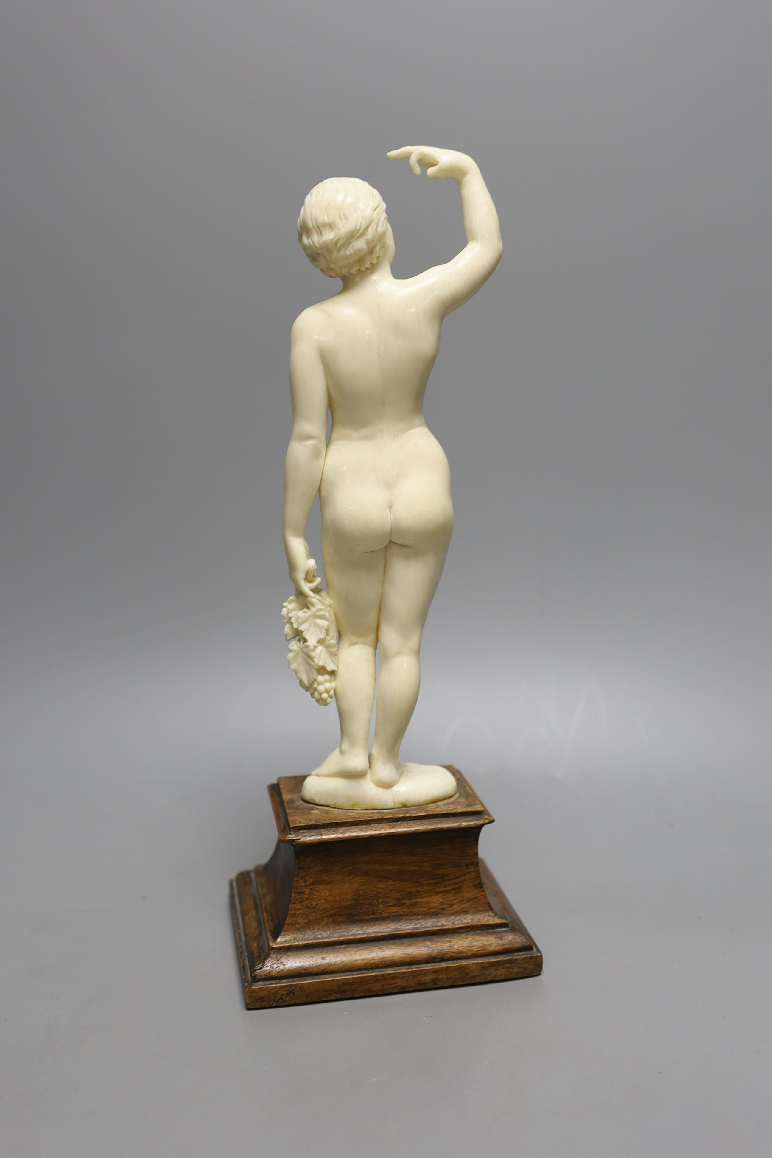 An early 20th century ivory figure of a nude maiden, possibly made in India or Burma for the European market - 32cm tall